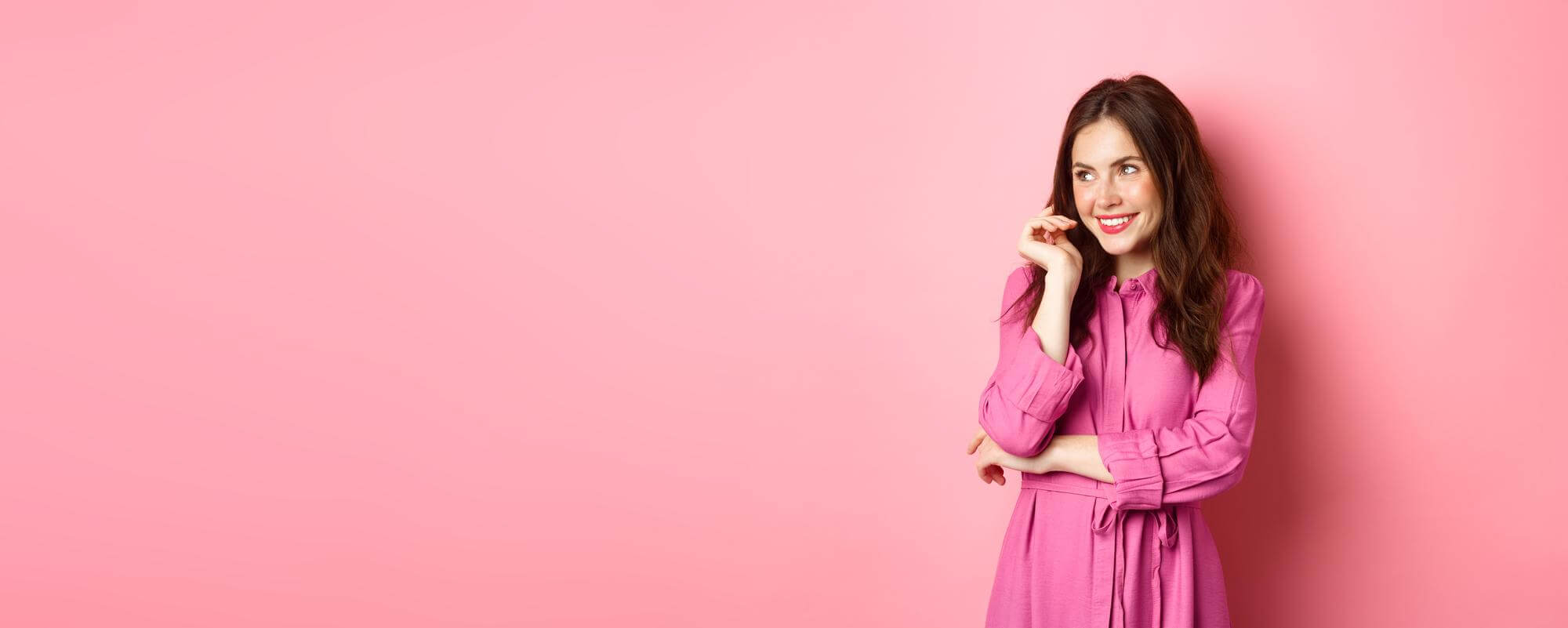 lady smiling with pink background