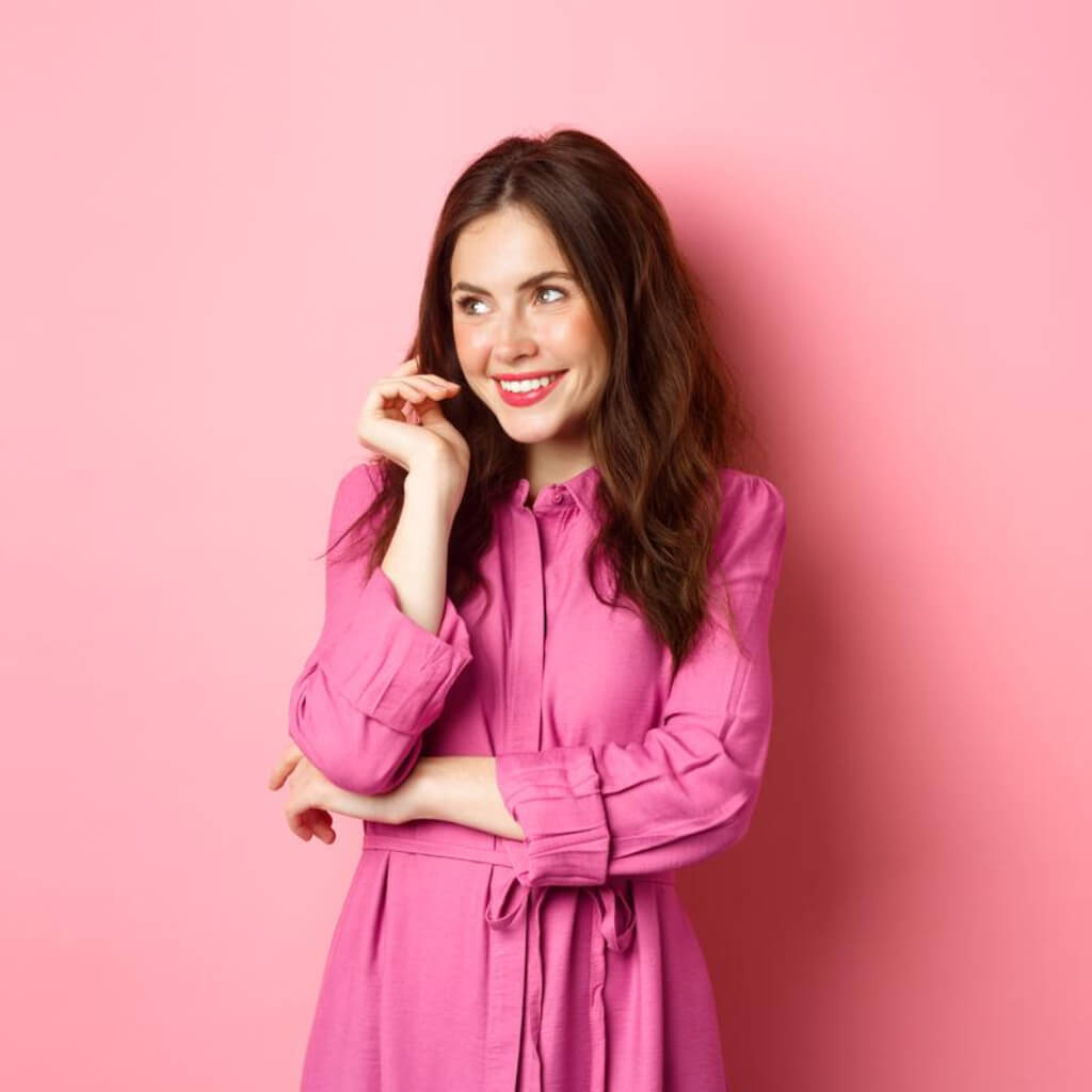 lady smiling in pink dress
