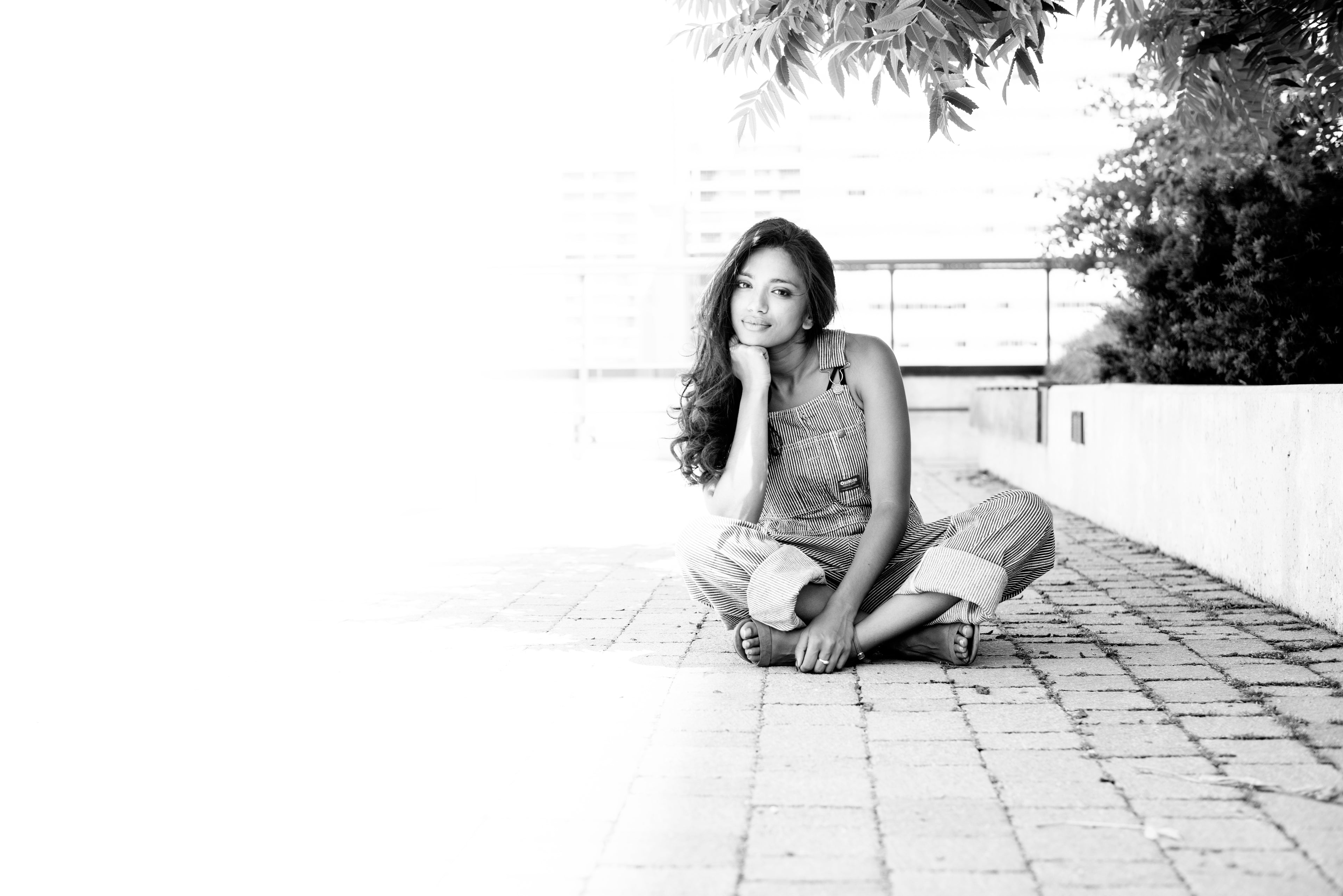 Pretty women sitting on the floor and smiling