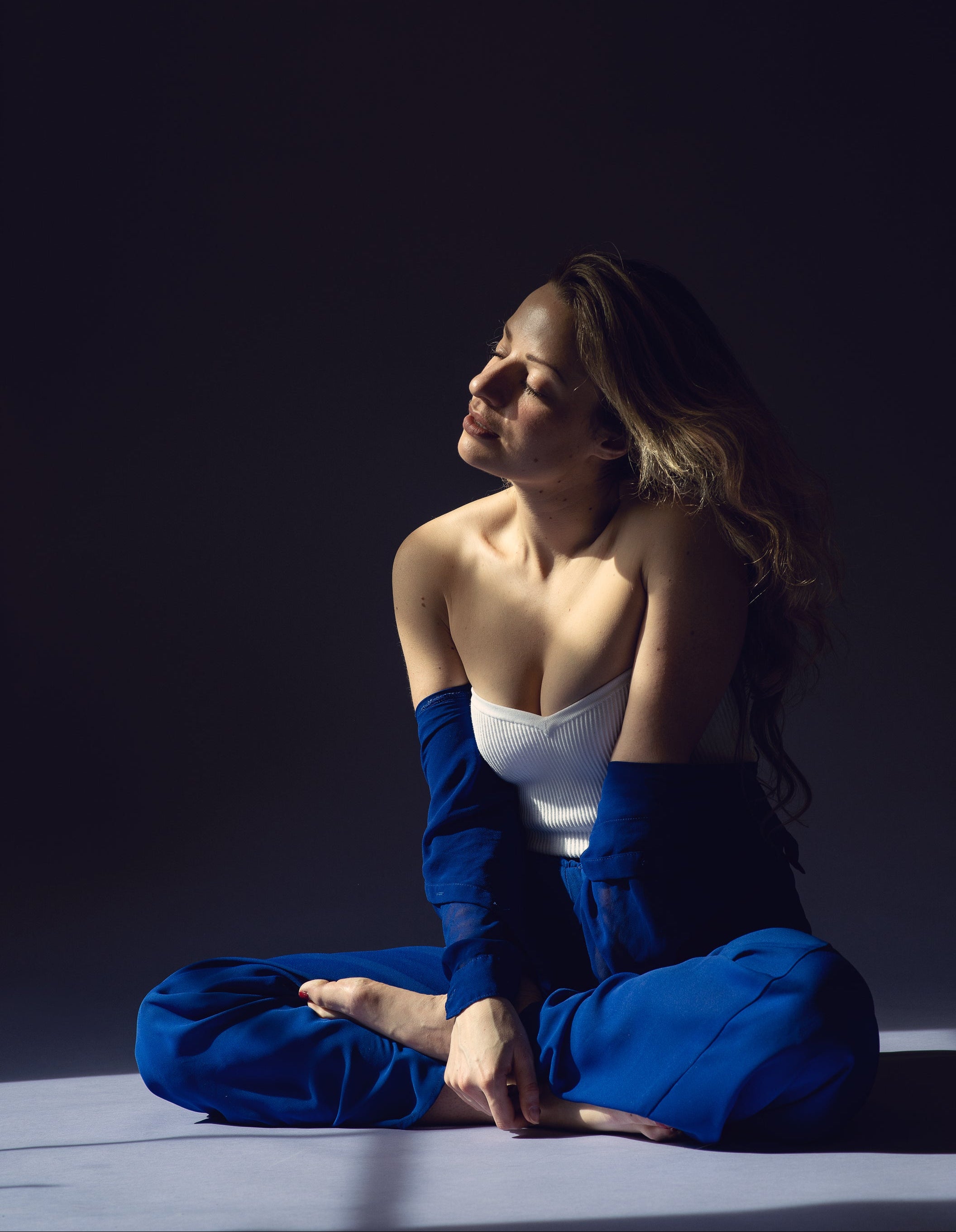 Women is relaxing in a joga position